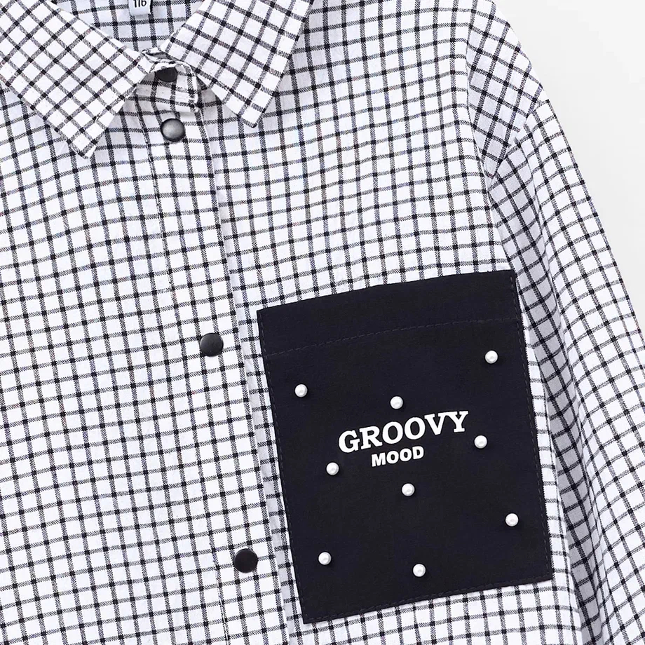 Укороченная блузка-рубашка в клетку для девочки фото