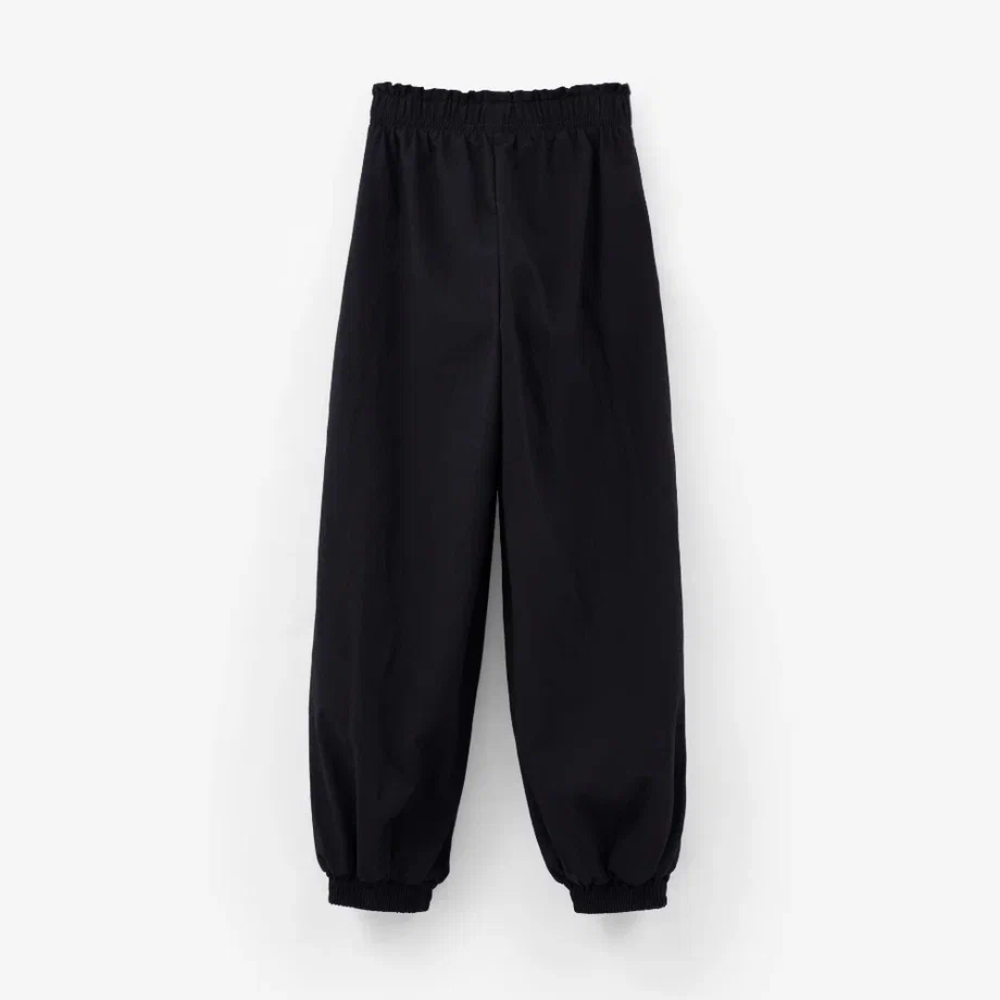 Чёрные брюки с манжетами с жемчугом для девочки купить