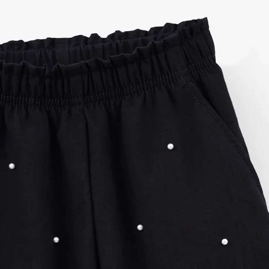 Чёрные брюки с манжетами с жемчугом для девочки фото