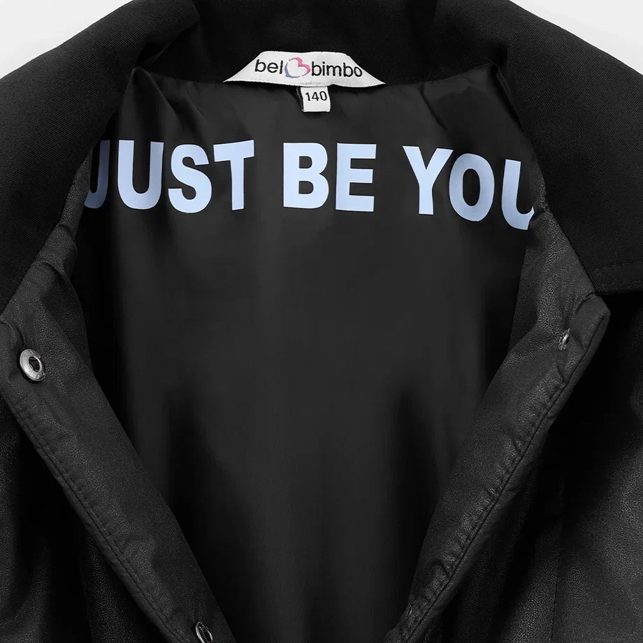 Чёрная стёганая куртка для девочки фото