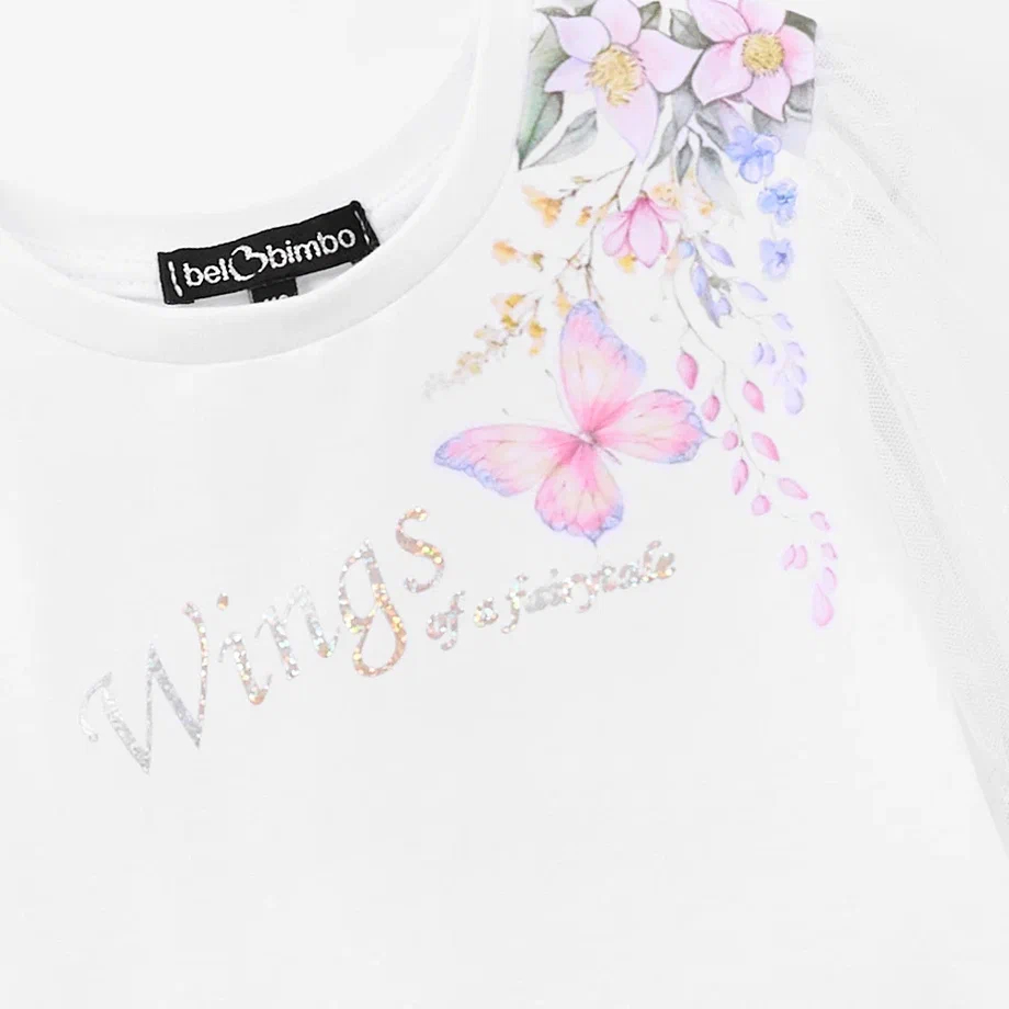 Укороченная белая блузка с воздушными рукавами для девочки фото