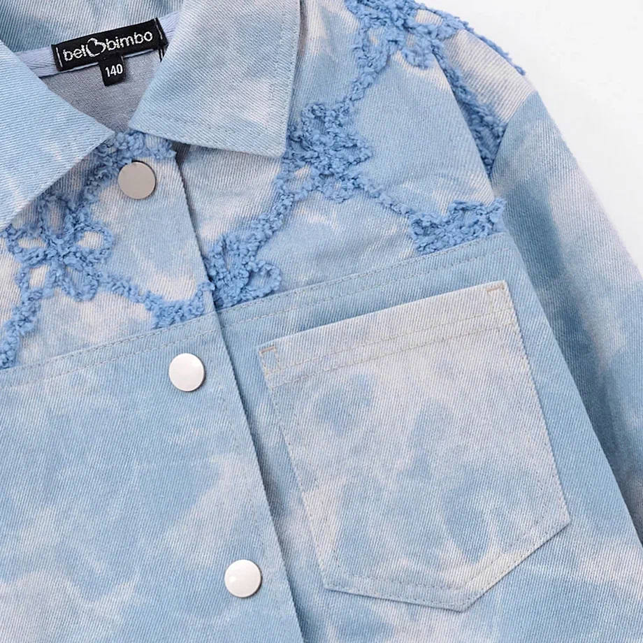 Укороченный жакет из варёного денима с вышивкой фото