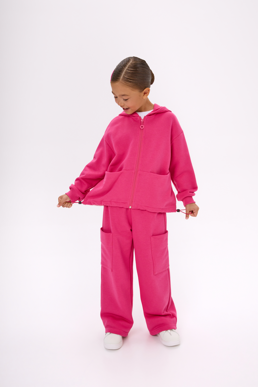 Брюки с карманами оттенка фуксия для девочки куить в Иваново