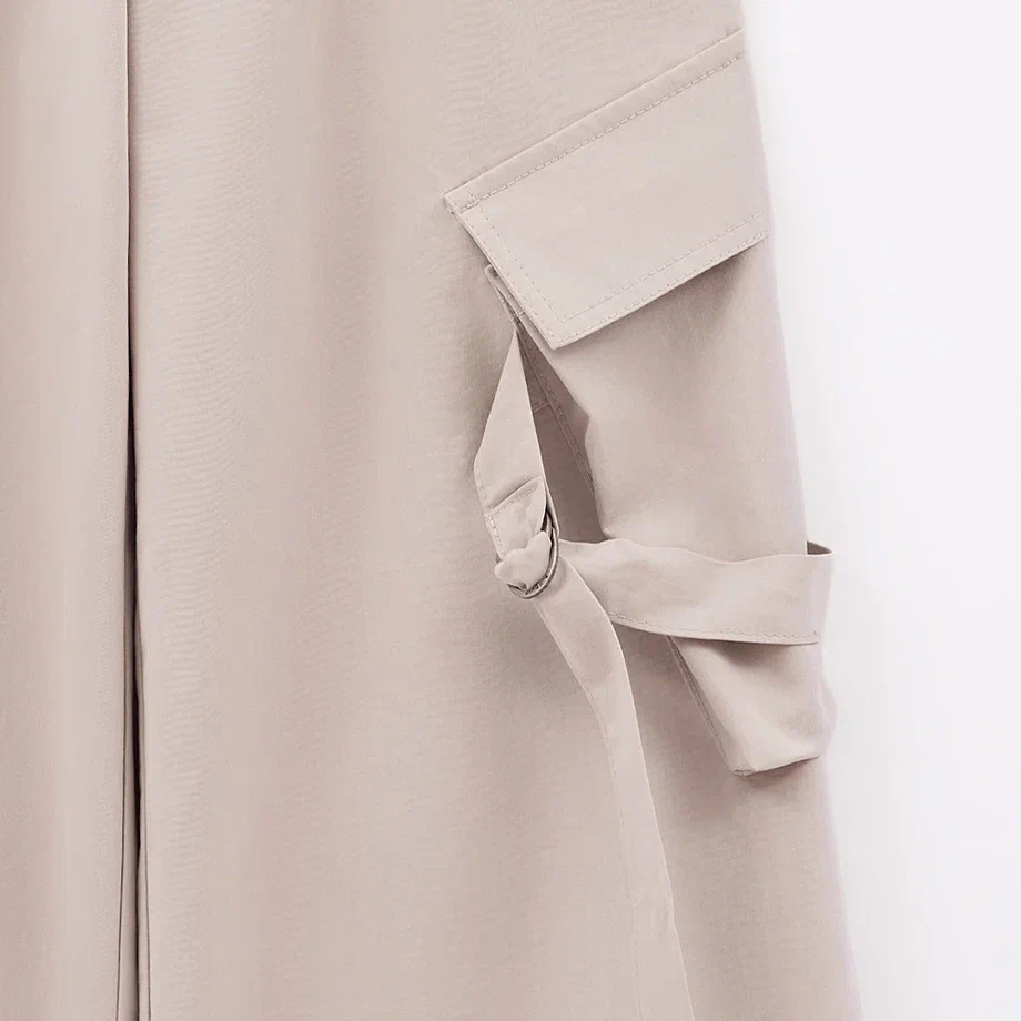 Бежевые брюки с карманами для девочки фото