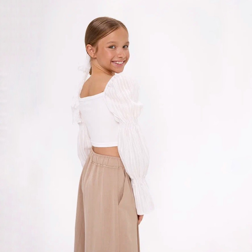 Укороченная молочная блузка для девочки куить в Иваново