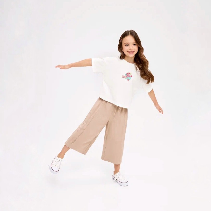 Молочный укороченный топ для девочки куить в Иваново